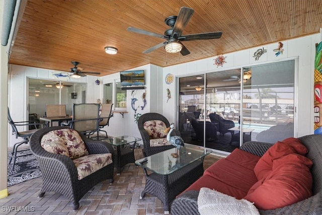 view of patio featuring outdoor lounge area and ceiling fan