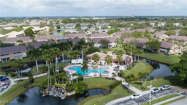 aerial view with a water view and a residential view