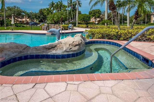 pool with a community hot tub