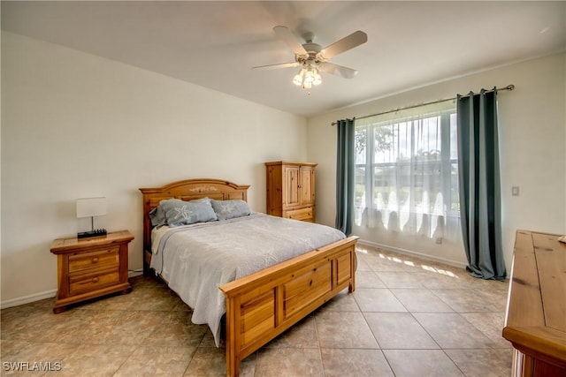 9321 Alamander Ct Unit 204, Fort Myers, FL 33919 - bedroom featuring light tile patterned floors and ceiling fan