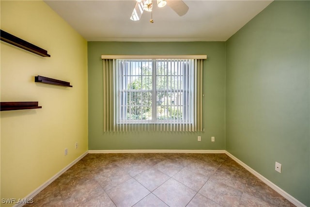 9321 Alamander Ct Unit 204, Fort Myers, FL 33919 - empty room featuring ceiling fan and tile patterned floors