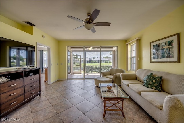 9321 Alamander Ct Unit 204, Fort Myers, FL 33919 - tiled living room featuring a ceiling fan