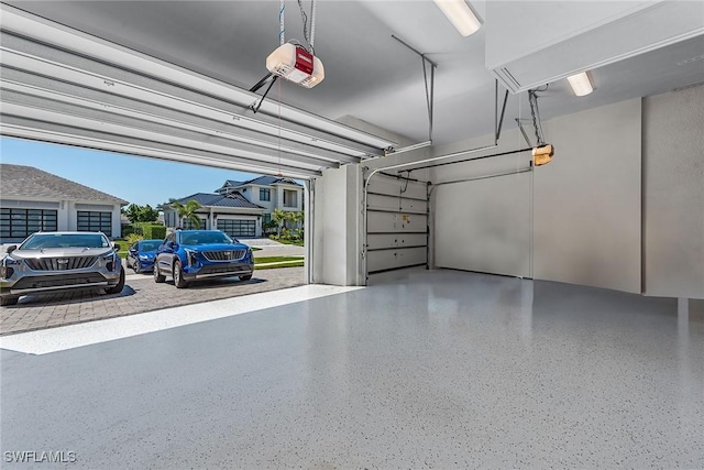 garage featuring a garage door opener