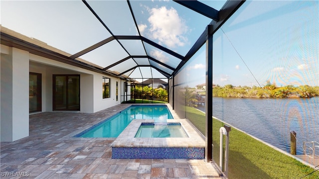 1523 NW 34th Ave, Cape Coral, FL 33993 - view of pool featuring a patio, a water view, a lanai, and a pool with connected hot tub