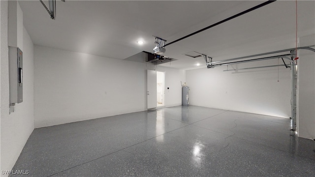1523 NW 34th Ave, Cape Coral, FL 33993 - garage featuring water heater and a garage door opener