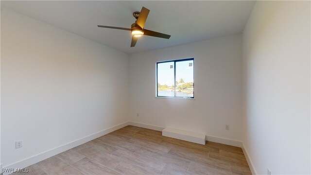 1523 NW 34th Ave, Cape Coral, FL 33993 - spare room featuring ceiling fan and baseboards