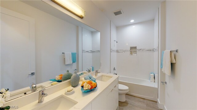 1523 NW 34th Ave, Cape Coral, FL 33993 - full bath with double vanity, shower / bathtub combination, and recessed lighting