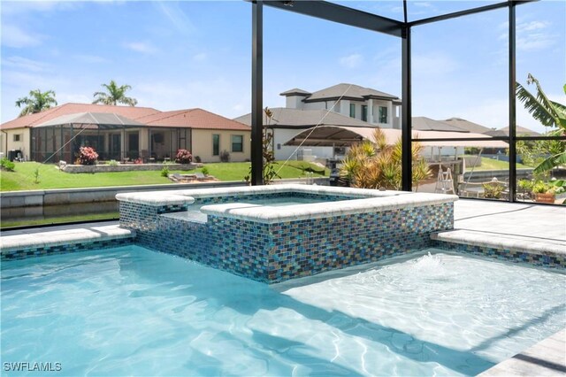 1523 NW 34th Ave, Cape Coral, FL 33993 - view of swimming pool featuring a pool with connected hot tub and a lanai