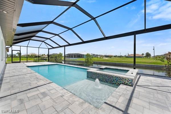 1523 NW 34th Ave, Cape Coral, FL 33993 - view of pool featuring a patio, a pool with connected hot tub, and glass enclosure