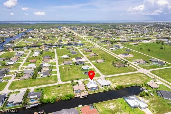 1523 NW 34th Ave, Cape Coral, FL 33993 - aerial overview of property's location featuring nearby suburban area