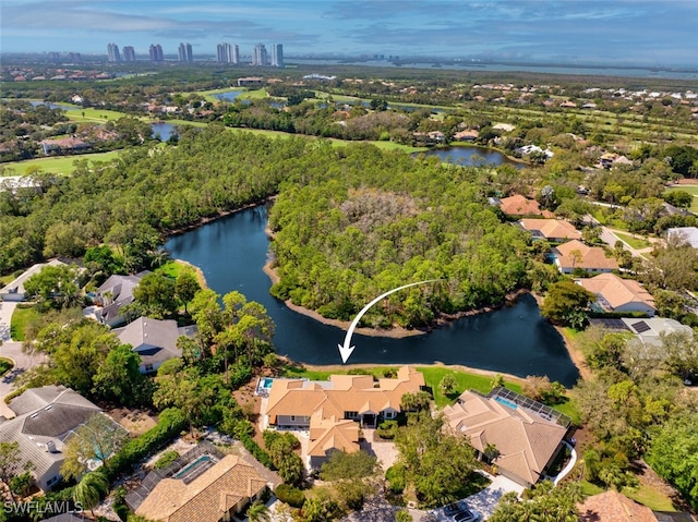 aerial view with a residential view and a water view