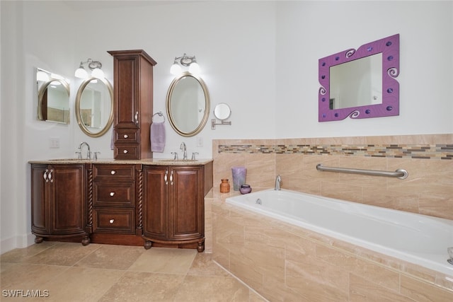 full bathroom featuring a bath, double vanity, a sink, and tile patterned floors