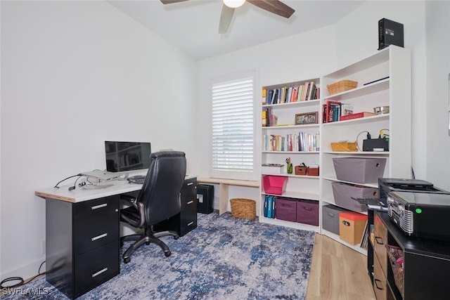 office area with ceiling fan and light wood-style flooring