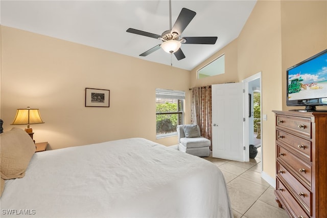 bedroom featuring light tile patterned floors, ceiling fan, and high vaulted ceiling