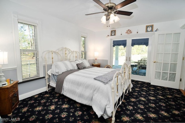 bedroom featuring access to outside, french doors, multiple windows, and carpet flooring