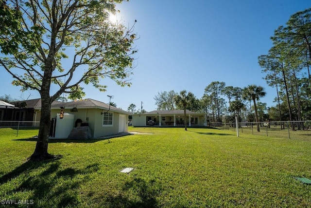 view of yard with fence