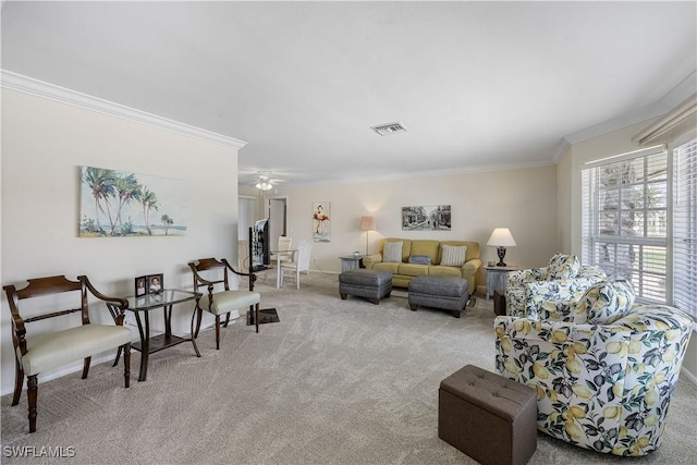 carpeted living room featuring ornamental molding and visible vents