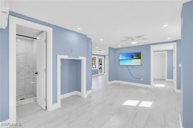 interior space featuring ceiling fan, recessed lighting, and baseboards