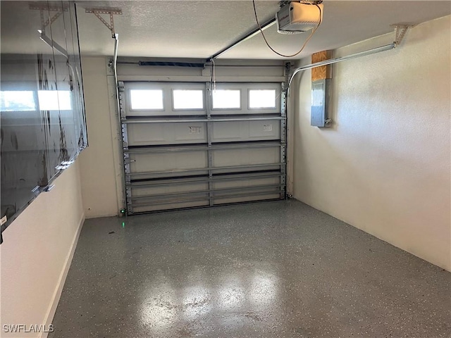 81 Cardinal Dr, North Fort Myers, FL 33917 - garage with a garage door opener and electric panel