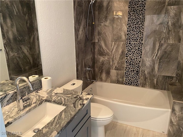 81 Cardinal Dr, North Fort Myers, FL 33917 - bathroom with a textured wall, vanity, toilet, and shower / bathtub combination