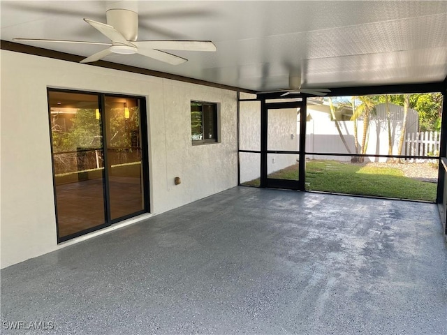 81 Cardinal Dr, North Fort Myers, FL 33917 - unfurnished sunroom featuring a ceiling fan