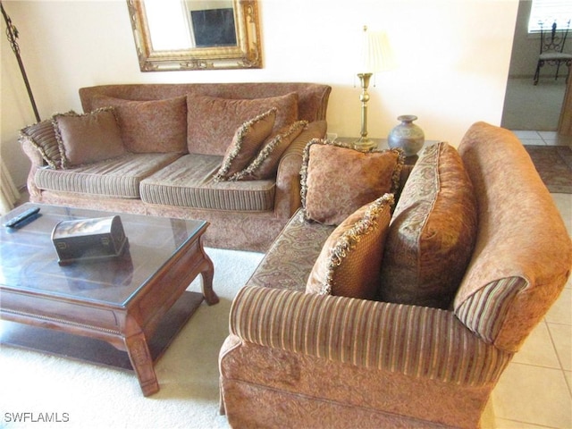 living room with tile patterned floors