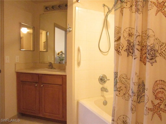 full bath featuring shower / tub combo with curtain and vanity