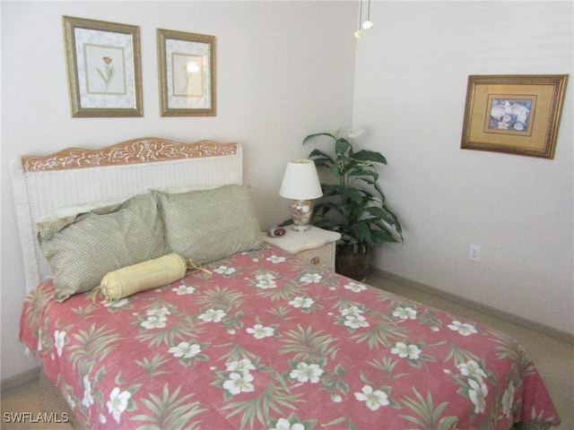 bedroom with baseboards