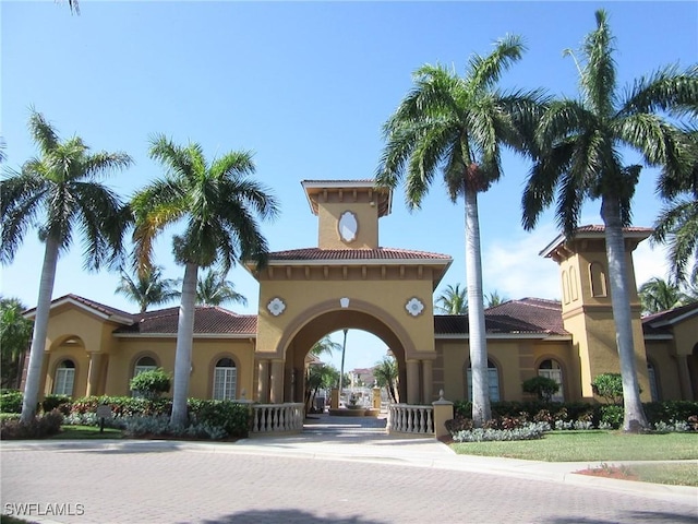 view of building exterior with driveway