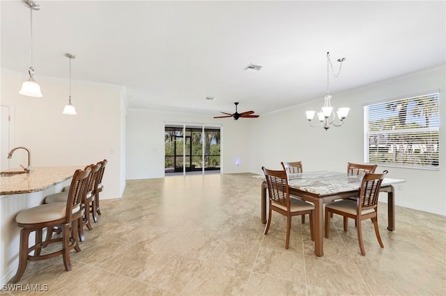 dining area featuring a ceiling fan, visible vents, crown molding, and baseboards