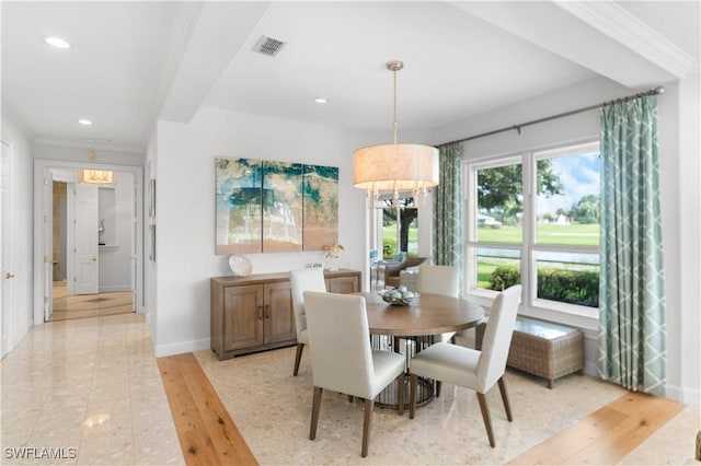 dining area with light wood-style floors, recessed lighting, visible vents, and crown molding