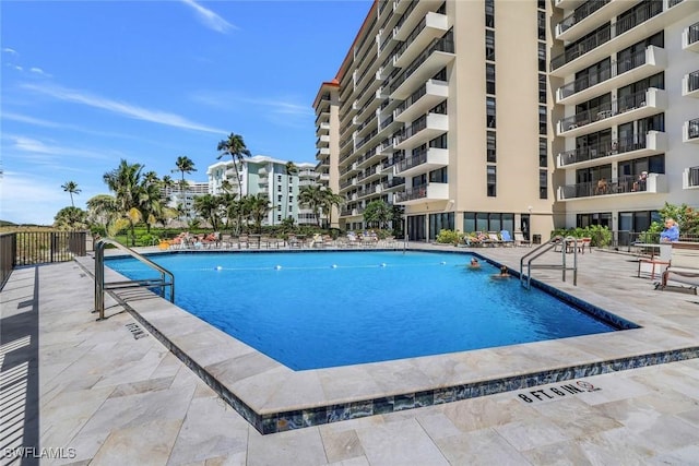 pool featuring a patio