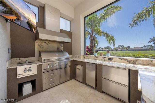 view of patio / terrace with area for grilling and exterior kitchen