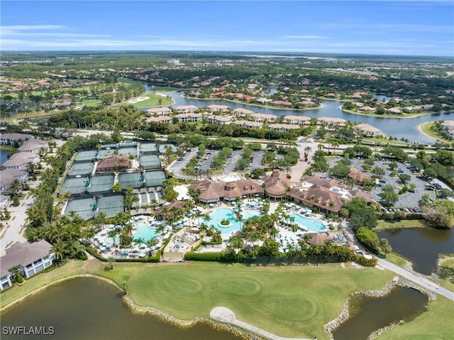 birds eye view of property featuring a water view and golf course view