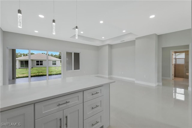 13224 Foresman Blvd, Port Charlotte, FL 33981 - kitchen with open floor plan, healthy amount of natural light, light countertops, pendant lighting, and recessed lighting
