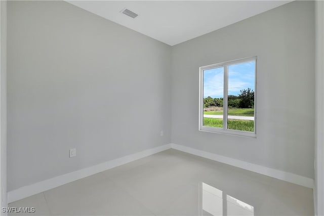 13224 Foresman Blvd, Port Charlotte, FL 33981 - spare room with baseboards and light tile patterned flooring