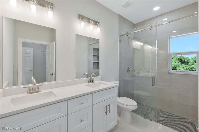 13224 Foresman Blvd, Port Charlotte, FL 33981 - full bath featuring a stall shower, double vanity, and tile patterned flooring