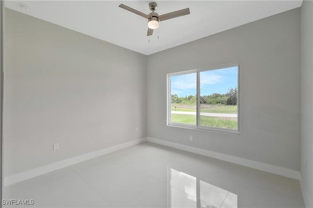 13224 Foresman Blvd, Port Charlotte, FL 33981 - spare room featuring baseboards and ceiling fan