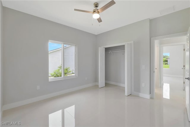 13224 Foresman Blvd, Port Charlotte, FL 33981 - unfurnished bedroom featuring a closet, ceiling fan, and light tile patterned flooring