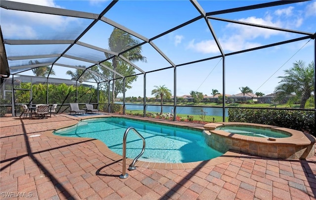 view of swimming pool with a pool with connected hot tub, a water view, a patio, and a lanai