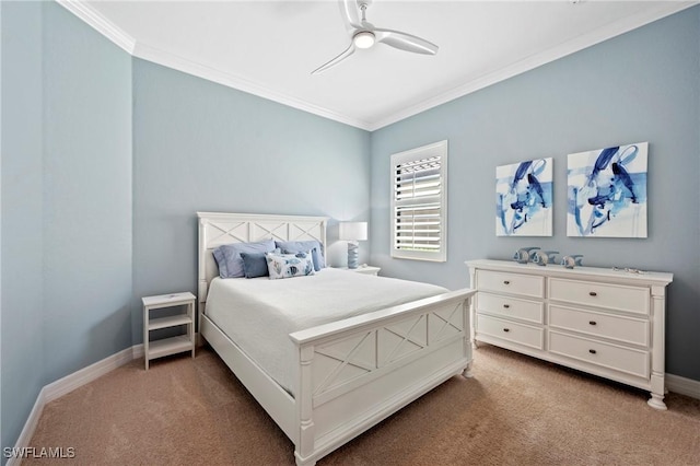 carpeted bedroom with ornamental molding, ceiling fan, and baseboards