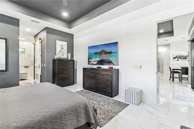 bedroom with a barn door, visible vents, ensuite bathroom, marble finish floor, and recessed lighting