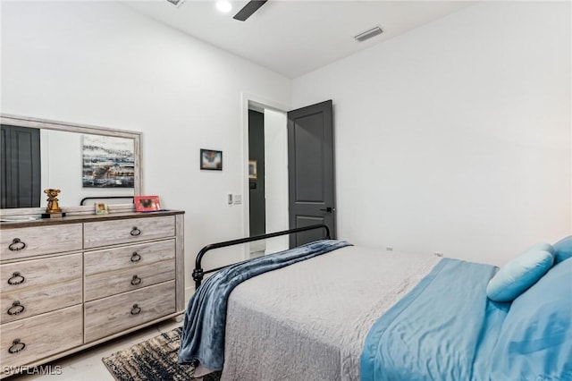 bedroom with visible vents and a ceiling fan