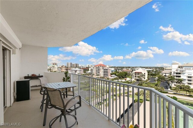 balcony featuring a view of city