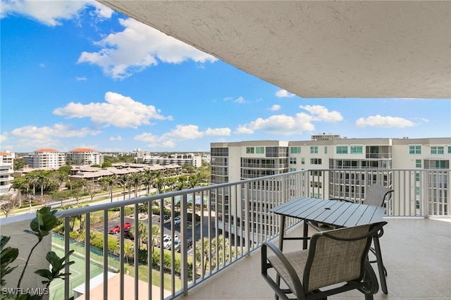 balcony featuring a city view