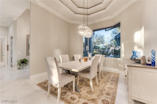 dining area with a chandelier, a raised ceiling, crown molding, and marble finish floor