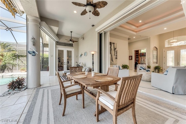 interior space featuring a raised ceiling, ceiling fan, crown molding, french doors, and recessed lighting