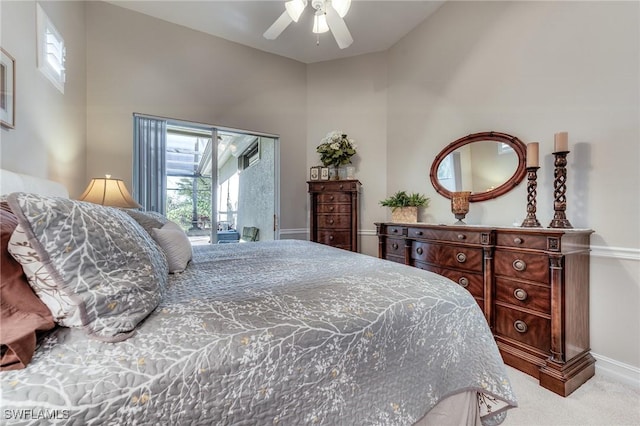 bedroom with carpet floors, access to outside, baseboards, and a ceiling fan