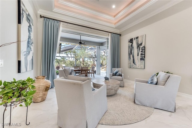 interior space with baseboards, a raised ceiling, a sunroom, marble finish floor, and crown molding