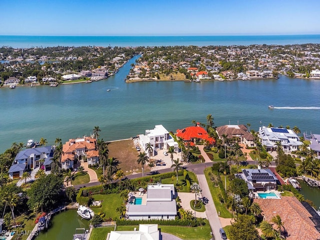 aerial view featuring a residential view and a water view